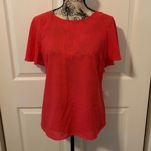 Dark pink blouse with flutter sleeve